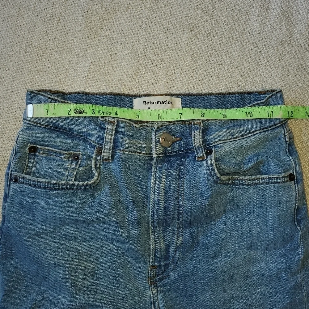 Reformation raw edge skinny jeans.